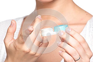 Contact lenses box in womans hand photo