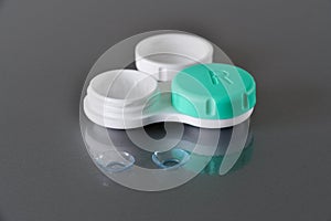 Contact lenses and container