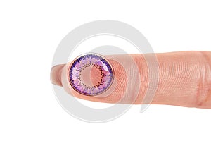 Contact lenses for the eyes. Female hands with natural nails holding contact lenses for the eyes.