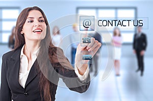 Contact us concept with business woman pressing transparent futu