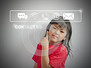 Contact us or Customer support concept. Little girl pointing up at a virtual screen of contact icons: live chat, internet wifi,