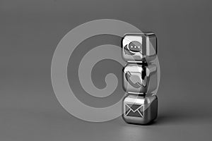 Contact us icon on metal cube for futuristic style