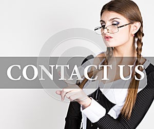 Contact us written on virtual screen. secretary in a business suit with glasses, presses button on virtual screens