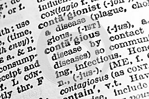 Contagious - Closeup macro of English word contagious