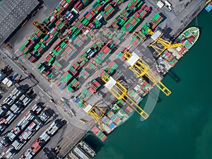 Container box loading by crane, Vessel boat in logistic port