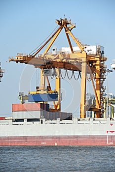 Container cargo freight ship with blue sky