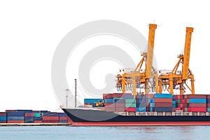 Container cargo freight ship with working crane loading bridge