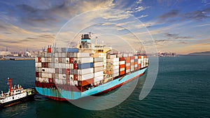 Container cargo ship carrying commercial container in import export business commerce logistic and transportation of international