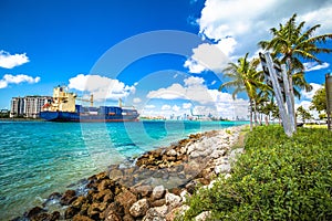 Container cargo ship entering the port of Miami through Government Cut channel