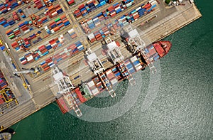 Container , container ship in export and import business and logistics. Shipping cargo to harbor by crane. Water transport