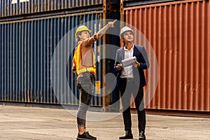 Container Depot chief talking to female foreman about custom goods packing list documents