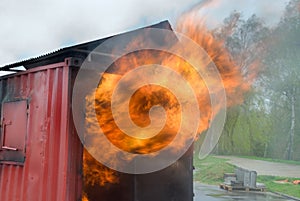 Container fire blazing photo