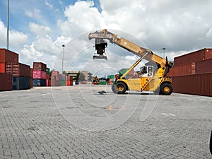 container forklift on ground of port