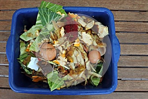 Container full of domestic food waste