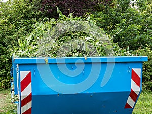 Container with garden waste recycling photo