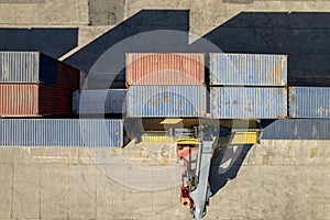 Container Handler in Port Terminal. Transportation of the containers for export and import the goods to the cargo