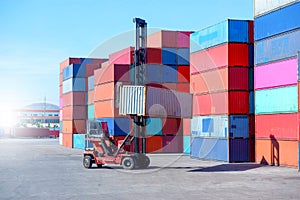 Container handlers in the harbor For imports and exports photo