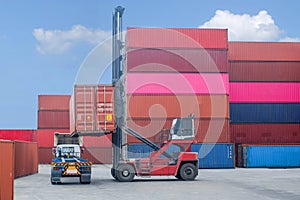 Container handlers Load to truck In the shipping dock with storage cabinet background, industrial ideas Import and export