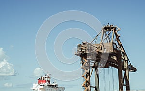 Container handling cranes and a ship