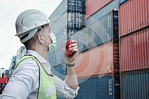 Container Logistics Shipping Management of Transportation Industry, Transport Engineer Control Via Walkie-Talkie to Worker in