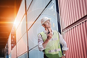 Container Logistics Shipping Management of Transportation Industry, Transport Engineer Control Via Walkie-Talkie to Worker in