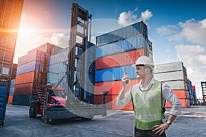 Container Logistics Shipping Management of Transportation Industry, Transport Engineer Control Via Walkie-Talkie to Worker in