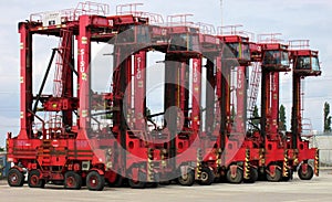 Container reach stacker moving containers around at Southampton docks UK