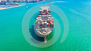 Container ship arriving in port, container ship going to deep sea port logistic business import export shipping and transportation