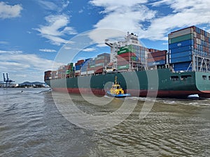 Container ship being forwarded to the Port of Navegantes, SC, Brazil photo