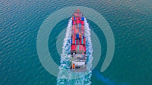 Container ship carrying container box for import and export business logistic and transportation by container ship in open sea,