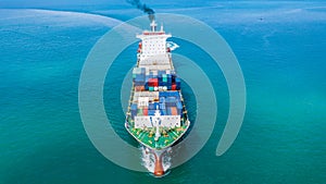 Container ship carrying container for import and export, Aerail view business logistic and transportation by ship in open sea