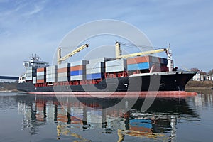 Container ship with cranes