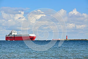 Container ship entering the port of Gdansk, Baltic Sea in Poland
