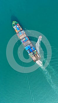 Container ship in export and import business and logistics. Ship