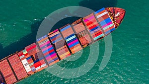 Container ship going to deep sea port, Business logistic import export shipping and transportation by container ship, Aerial view