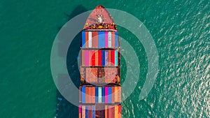 Container ship going to deep sea port, Business logistic import export shipping and transportation by container ship, Aerial view