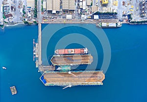 Container ship in import export and business logistic.By crane ,