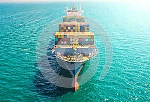 Container ship in import export and business logistic.By crane ,