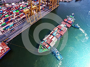 Container ship in import export and business logistic.By crane ,