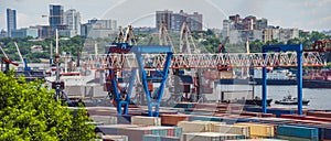 Container ship in import export and business logistic, By crane, Trade Port, Shipping cargo to harbor, Aerial view from