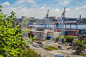 Container ship in import export and business logistic, By crane, Trade Port, Shipping cargo to harbor, Aerial view from