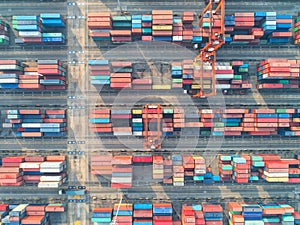 container ship in import export and business logistic, By crane, Trade Port, Shipping, cargo to harbor. Aerial view, Water