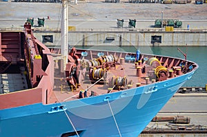 Container ship leaving dry dock.