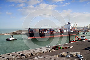 Container ship leaving port photo