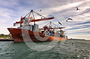 Container ship loaded merchandise to be exported, ready to go to another port