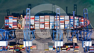 Container ship is loading in a port, Aerial top view container ship