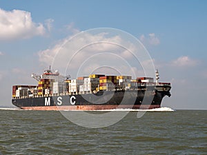 Container ship MSC Adelaide on Westerschelde in the Netherlands to port of Antwerp, Belgium