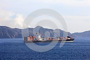 Container ship sailing from port