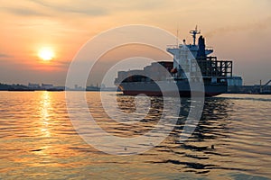Container ship at sunrise, Bangkok