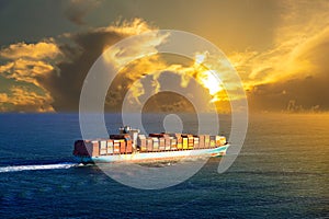 Container ship at sunset